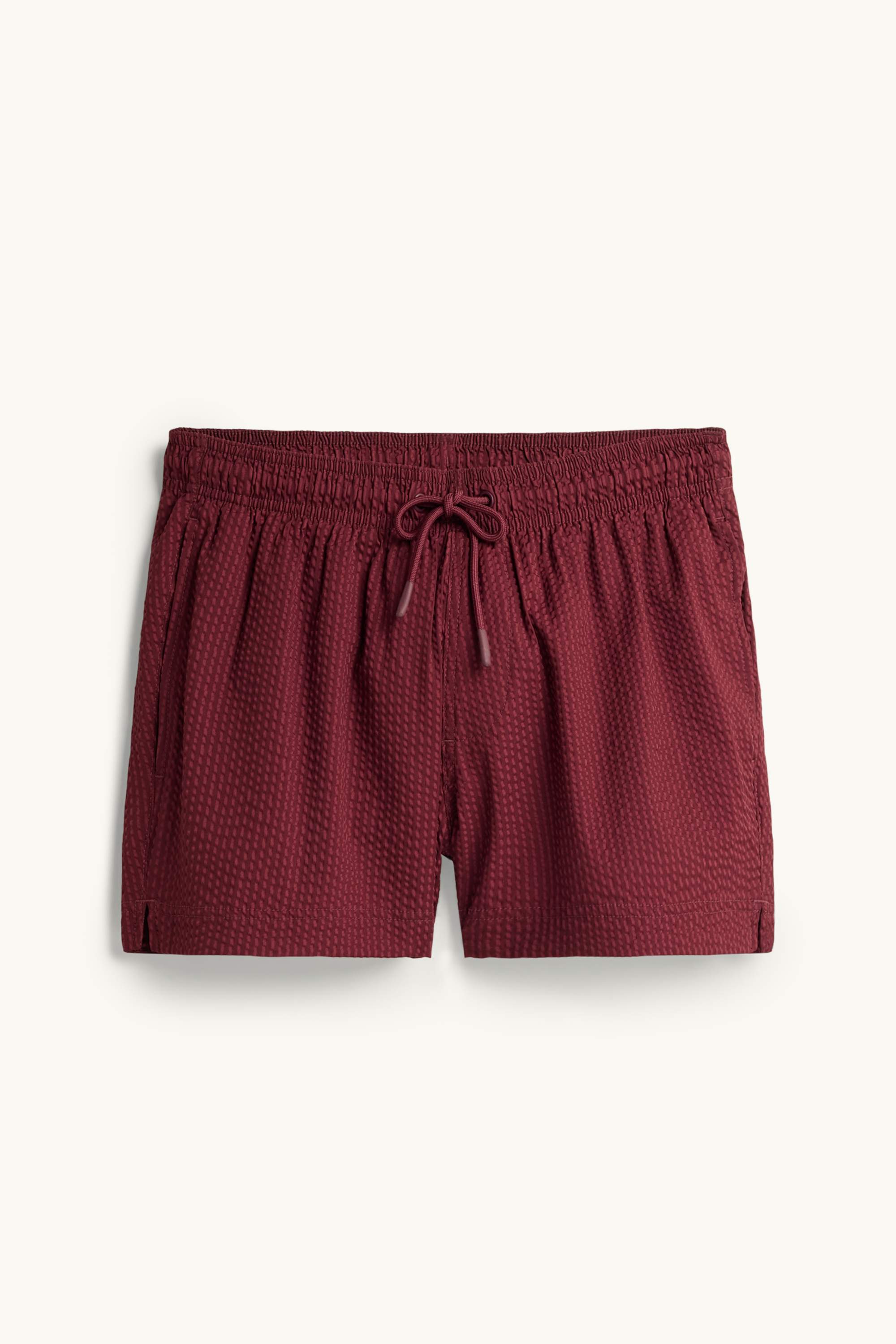 Swim shorts - textured dark red