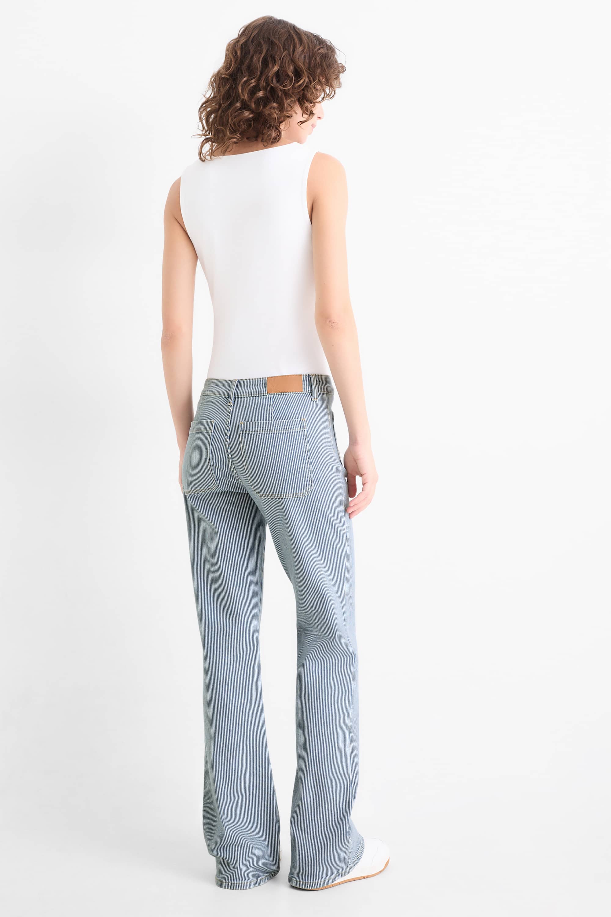 Flared jeans - mid-rise waist - striped blue