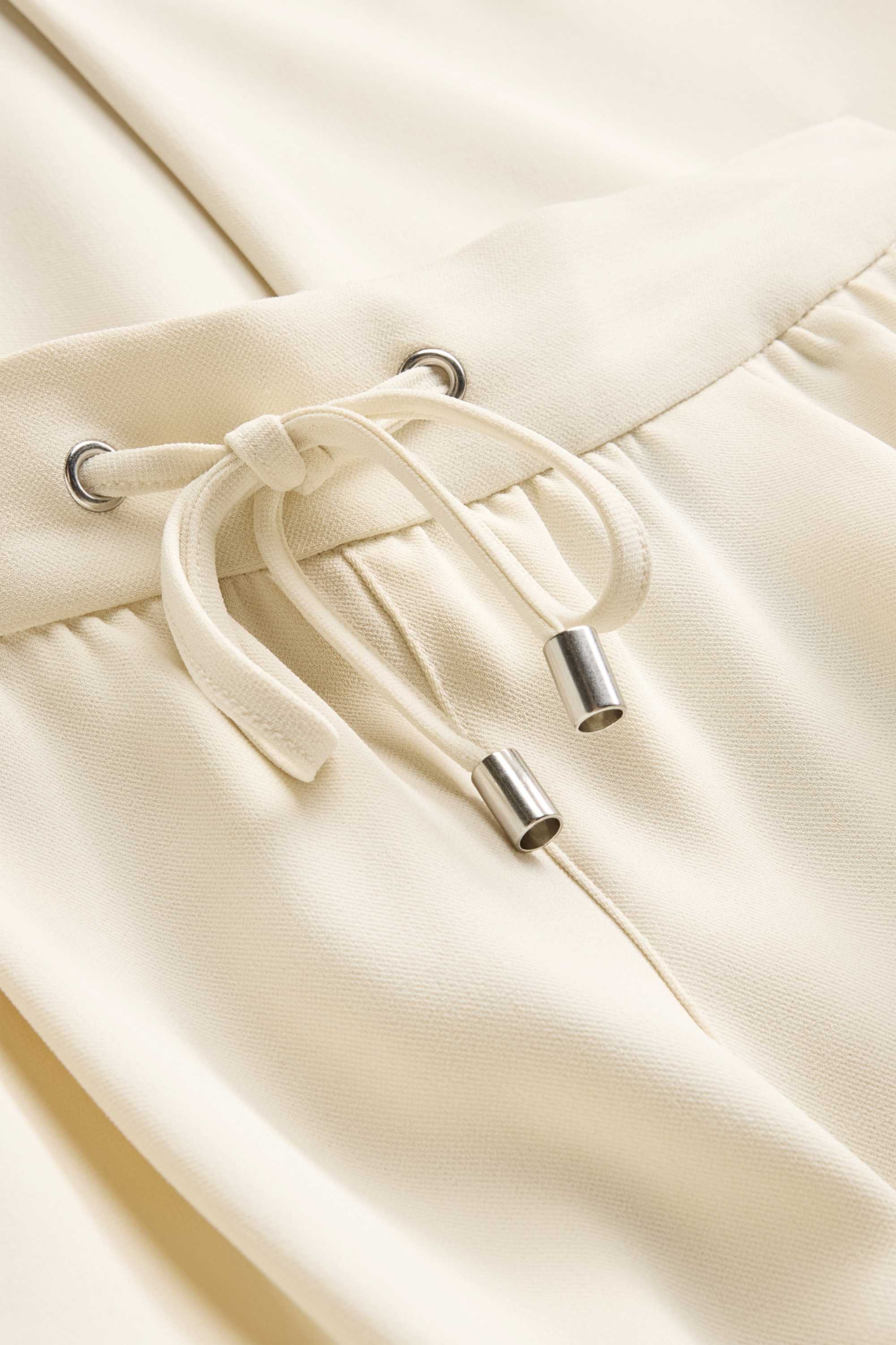 Cloth trousers - mid-rise waist - tapered leg white