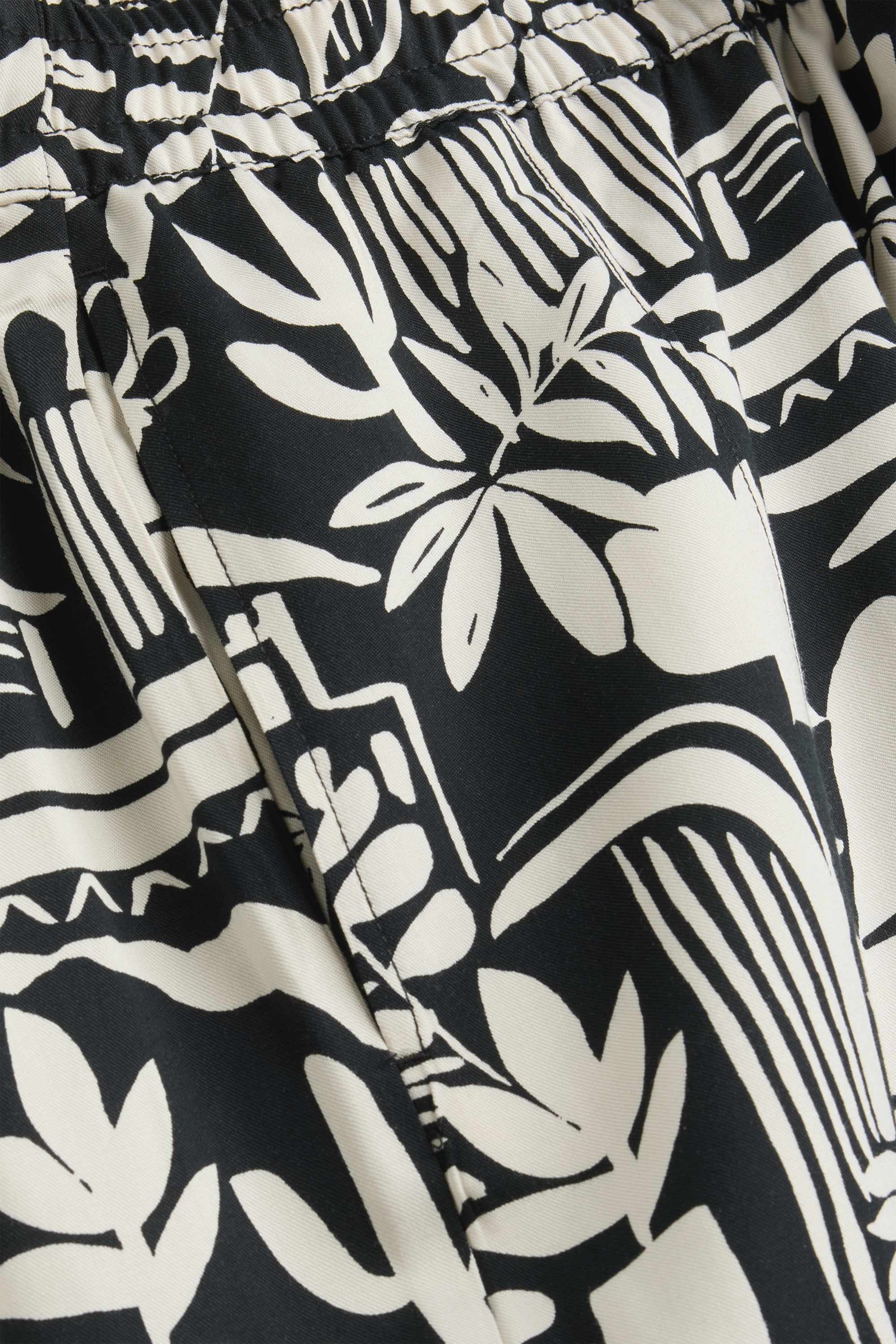 Cloth trousers - mid-rise waist - wide leg - patterned black / white