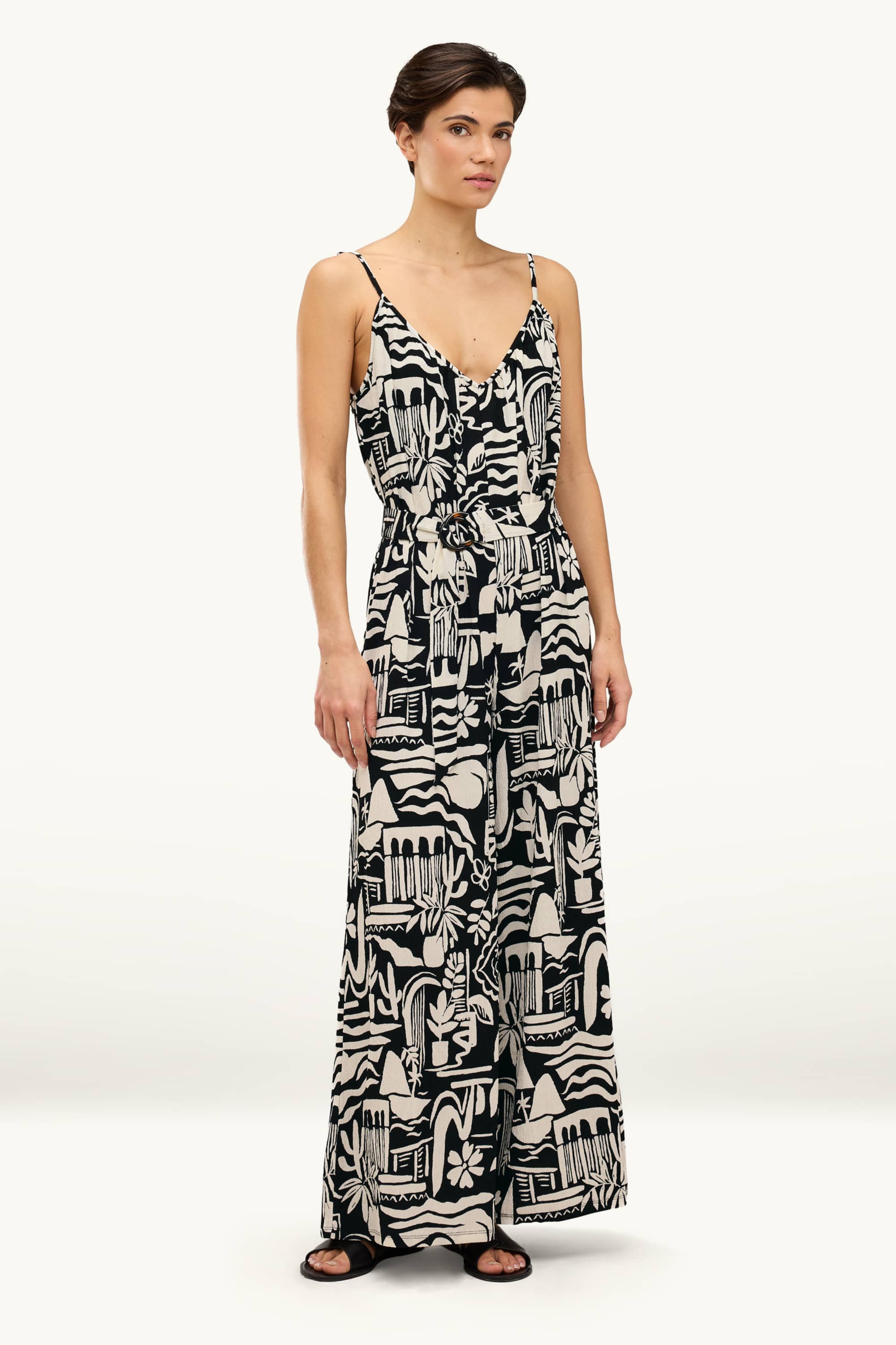 V-neck jumpsuit and belt - patterned black / white