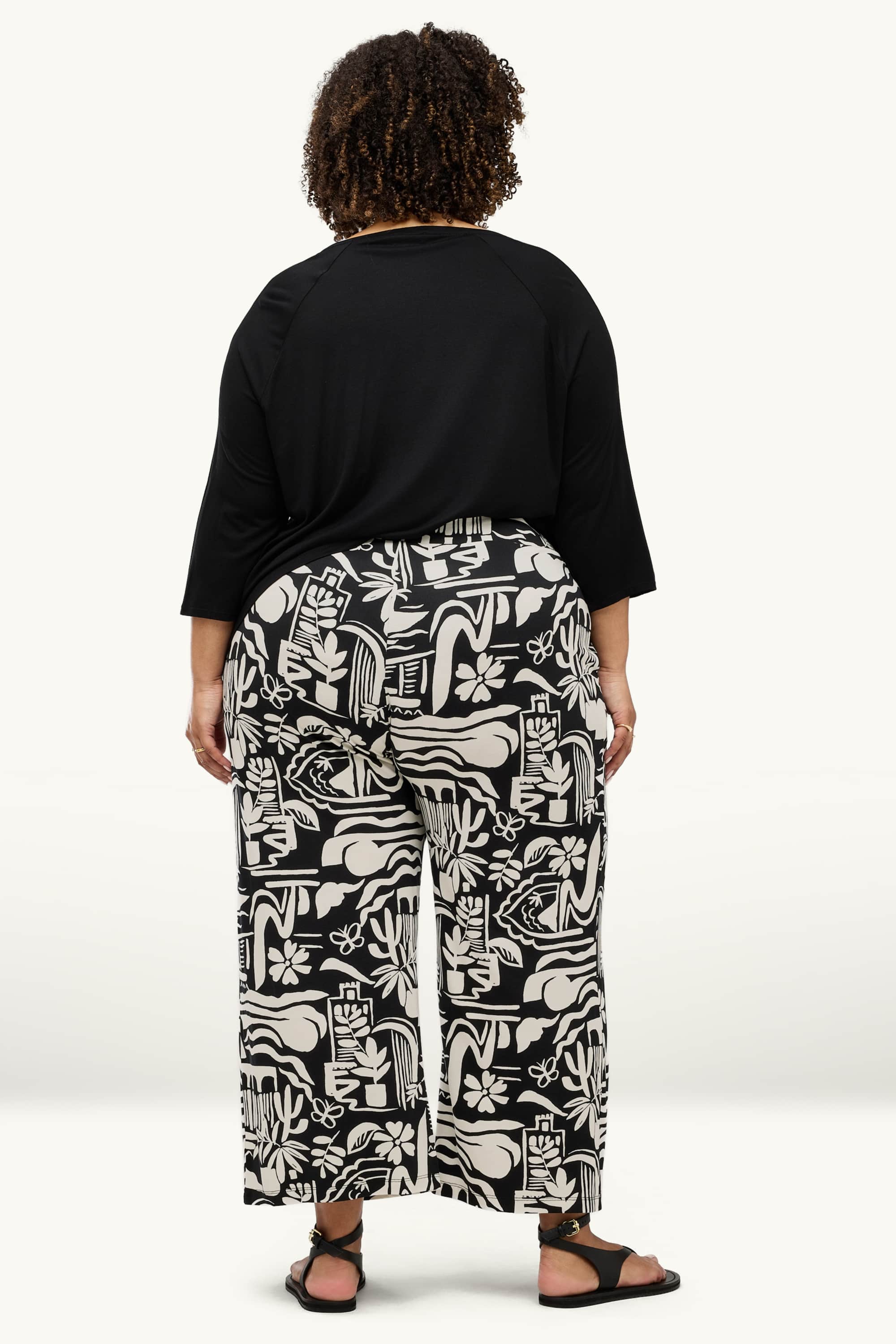 Cloth trousers - mid-rise waist - wide leg - patterned white / black