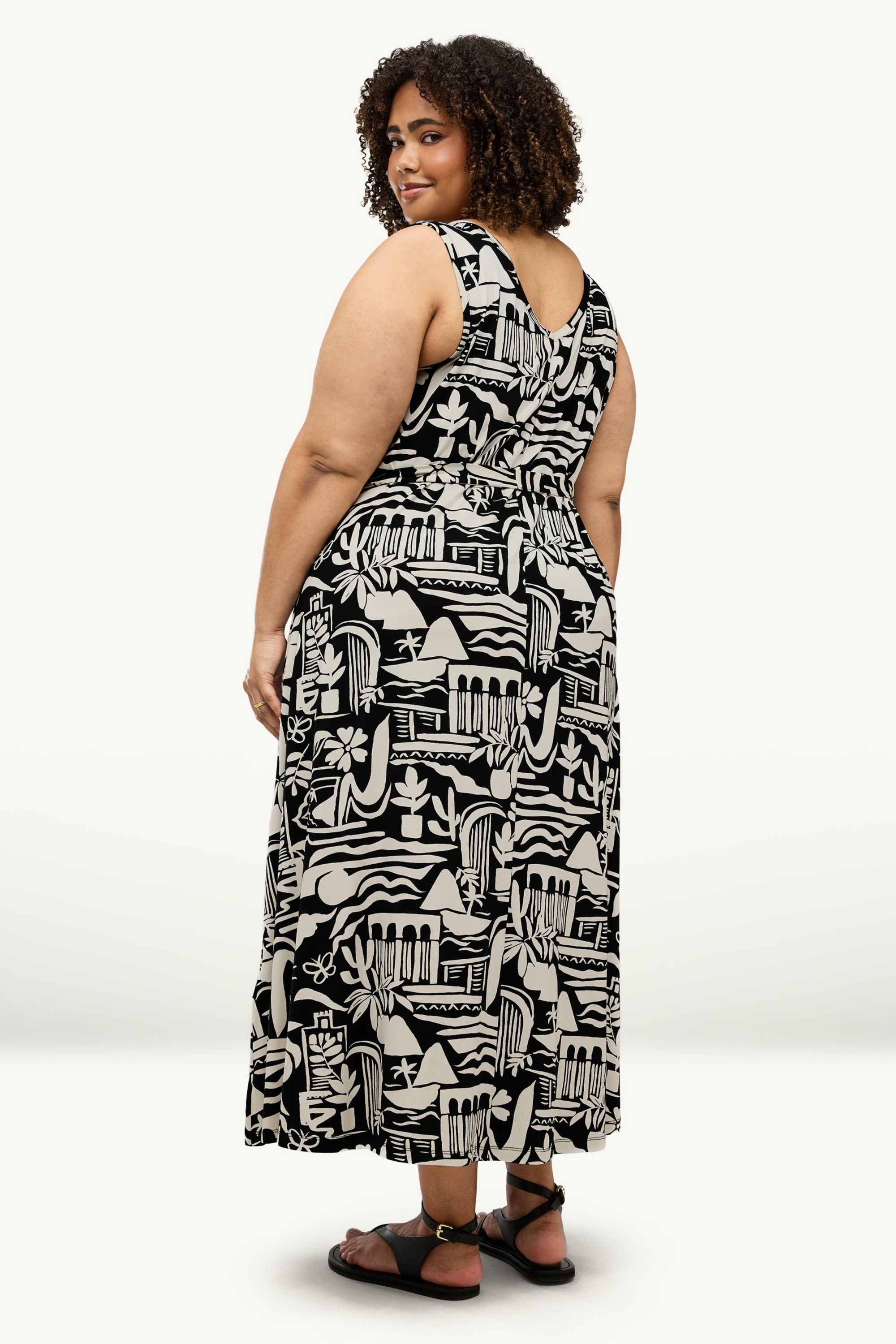 A-line dress with V-neck - patterned black / white
