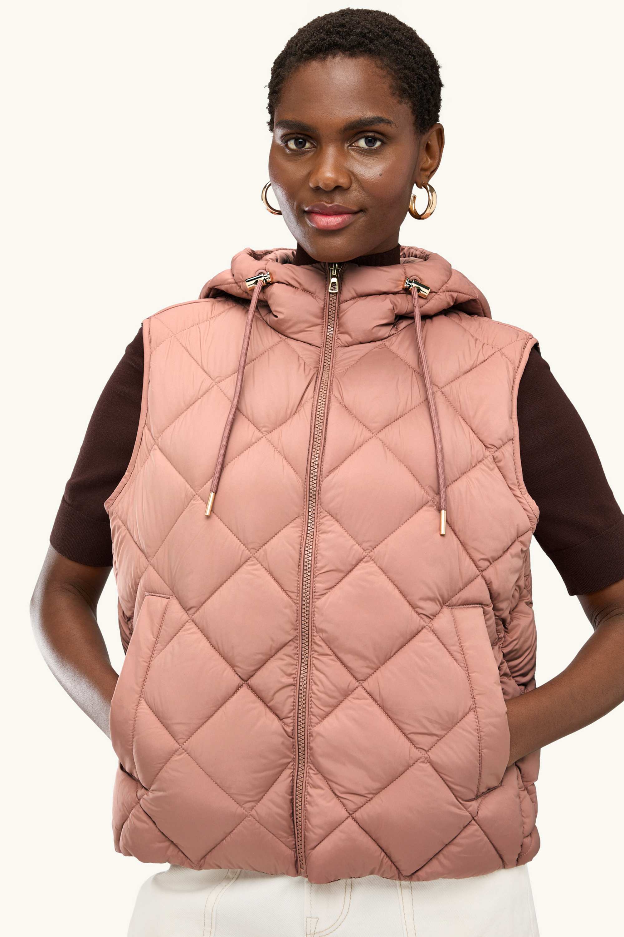 Quilted gilet with hood - water-repellent dark rose