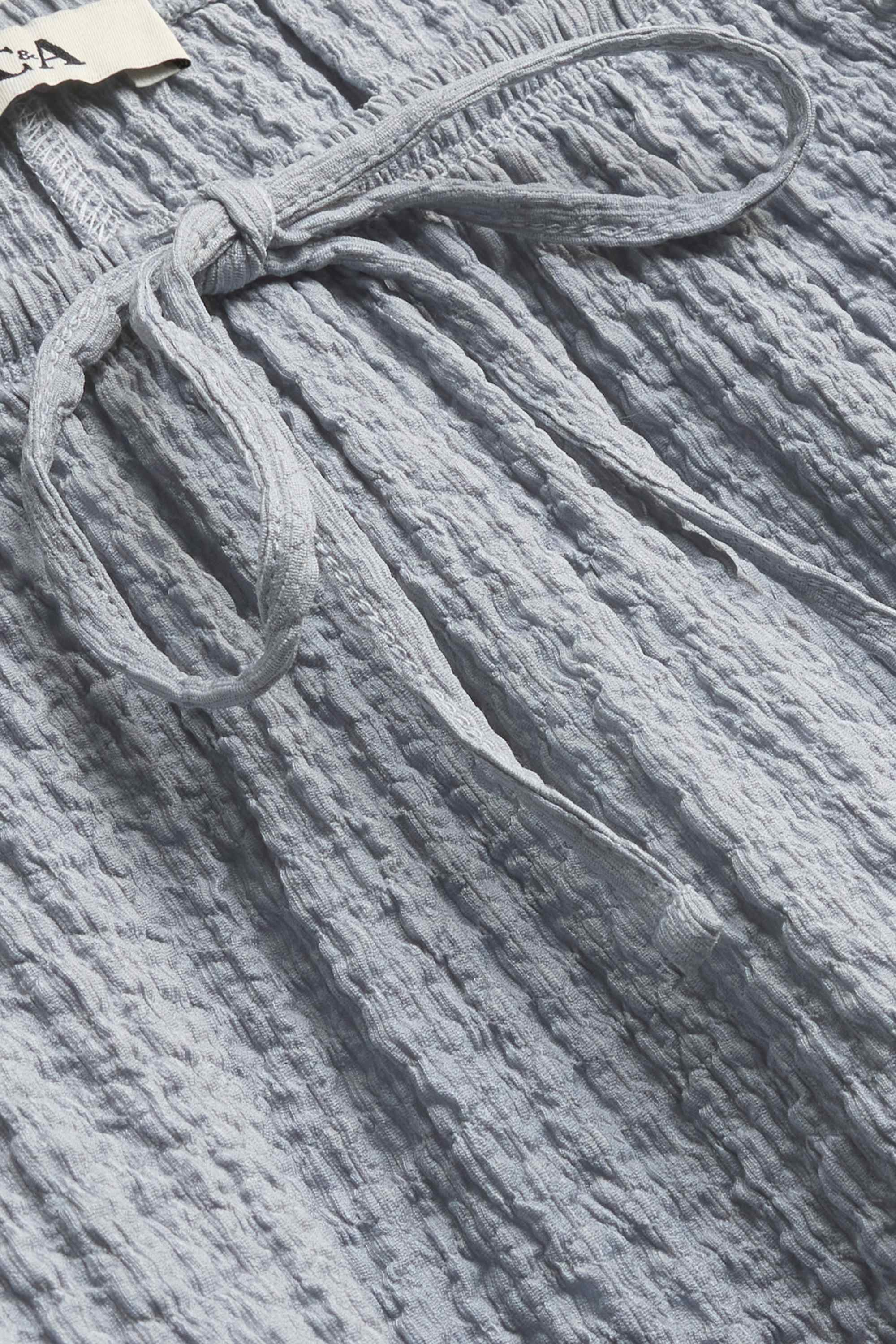 Cloth trousers - mid-rise waist - loose fit - textured light gray