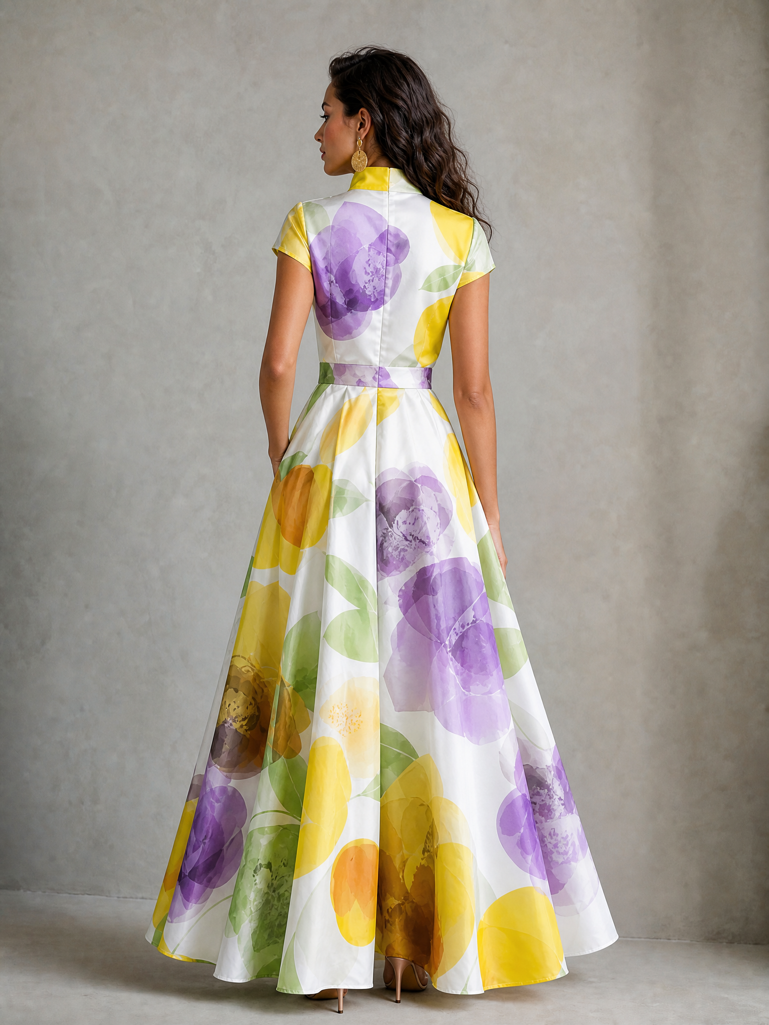 Exude effortless elegance and coastal charm in this stunning blue and white floral print long gown, a captivating and beautifully textured addition to the collection designed for the woman who loves refined silhouettes and classic botanical patterns. The