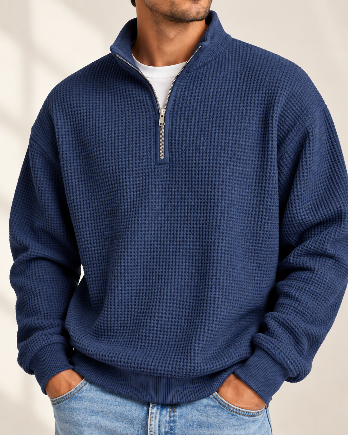 Close-up of the stand collar, half-zip and waffle texture
