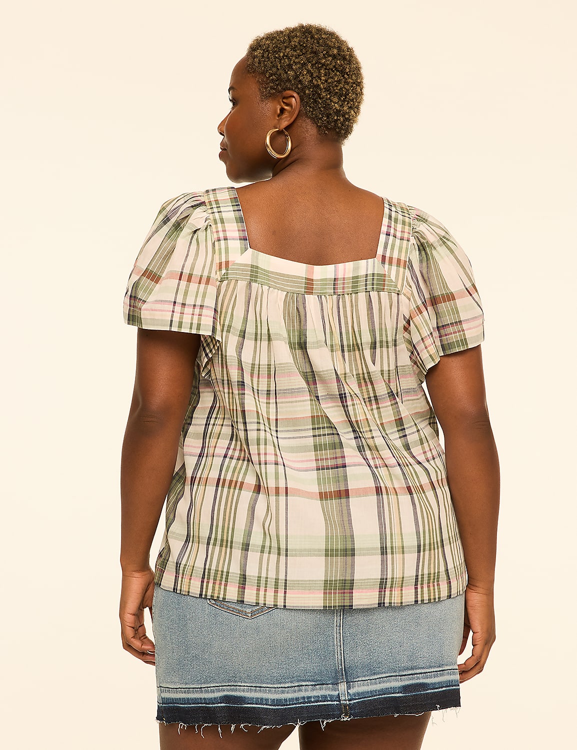A woman in a plaid top and denim skirt stands against a plain, light-colored background. Product Image 2