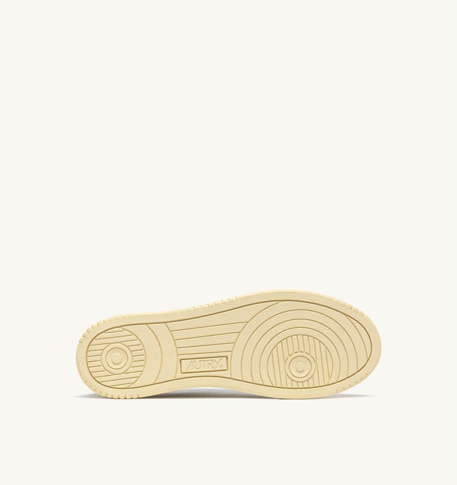 MEDALIST LOW IN WHITE AND BLACK LEATHER
