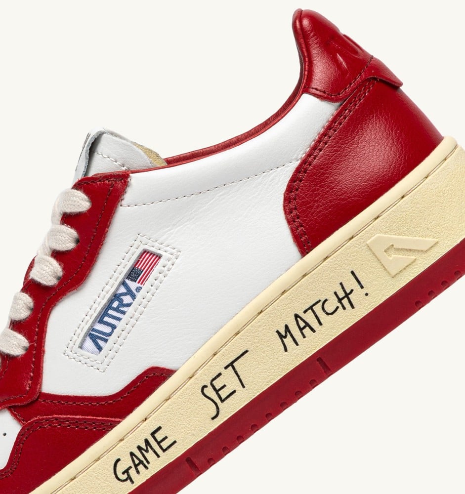 MEDALIST LOW IN WHITE AND RED LEATHER WITH LETTERING