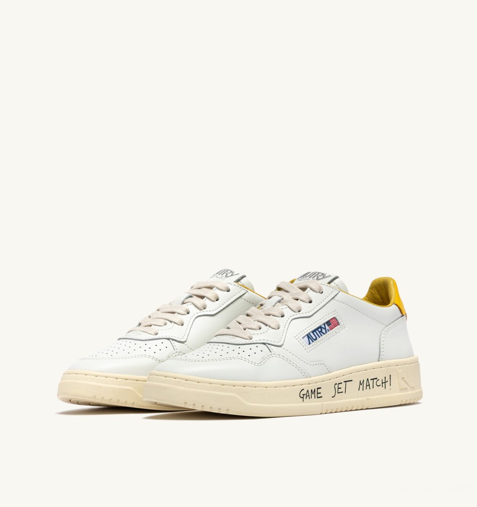 MEDALIST LOW IN WHITE AND SLICKER LEATHER WITH LETTERING