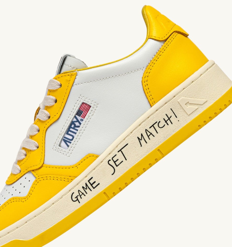 MEDALIST LOW IN WHITE AND SLICKER LEATHER WITH LETTERING