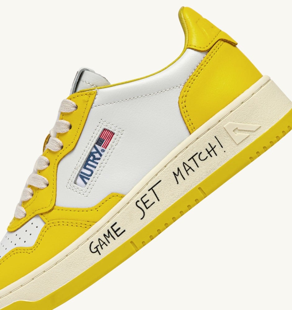 MEDALIST LOW IN WHITE AND SLICKER LEATHER WITH LETTERING