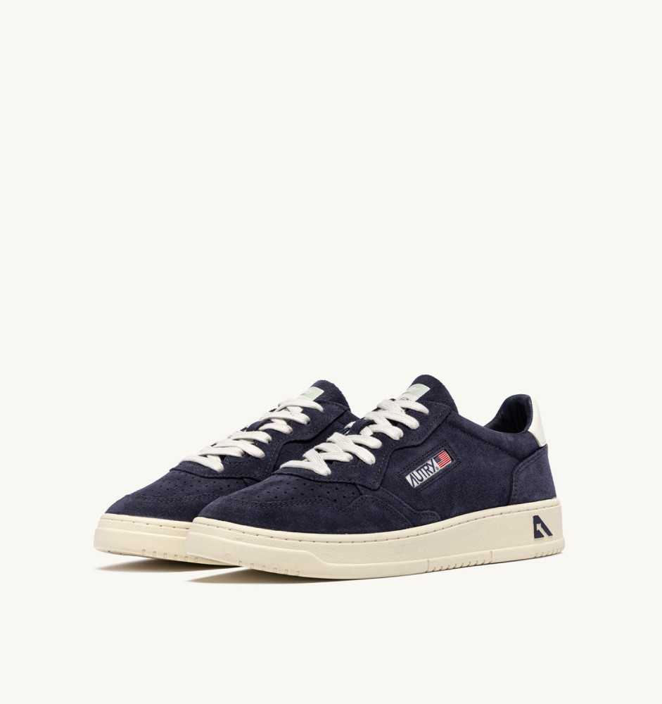 MEDALIST LOW IN SPACE AND WHITE SUEDE