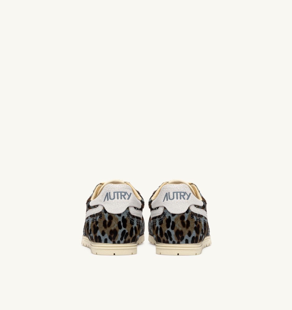 WINDSPIN IN GRAY LEOPARD AND WHITE PONY SKIN EFFECT MATERIAL