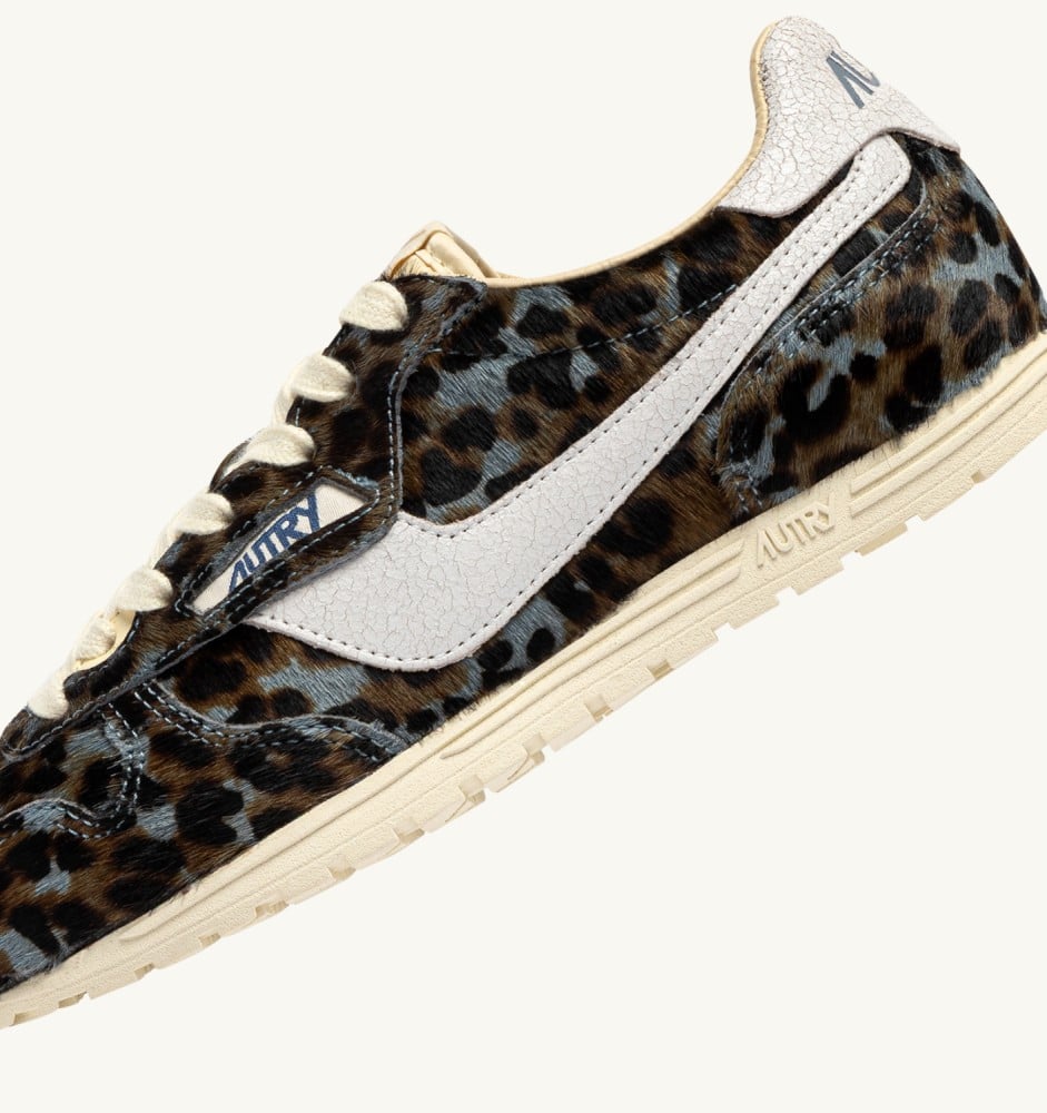 WINDSPIN IN GRAY LEOPARD AND WHITE PONY SKIN EFFECT MATERIAL