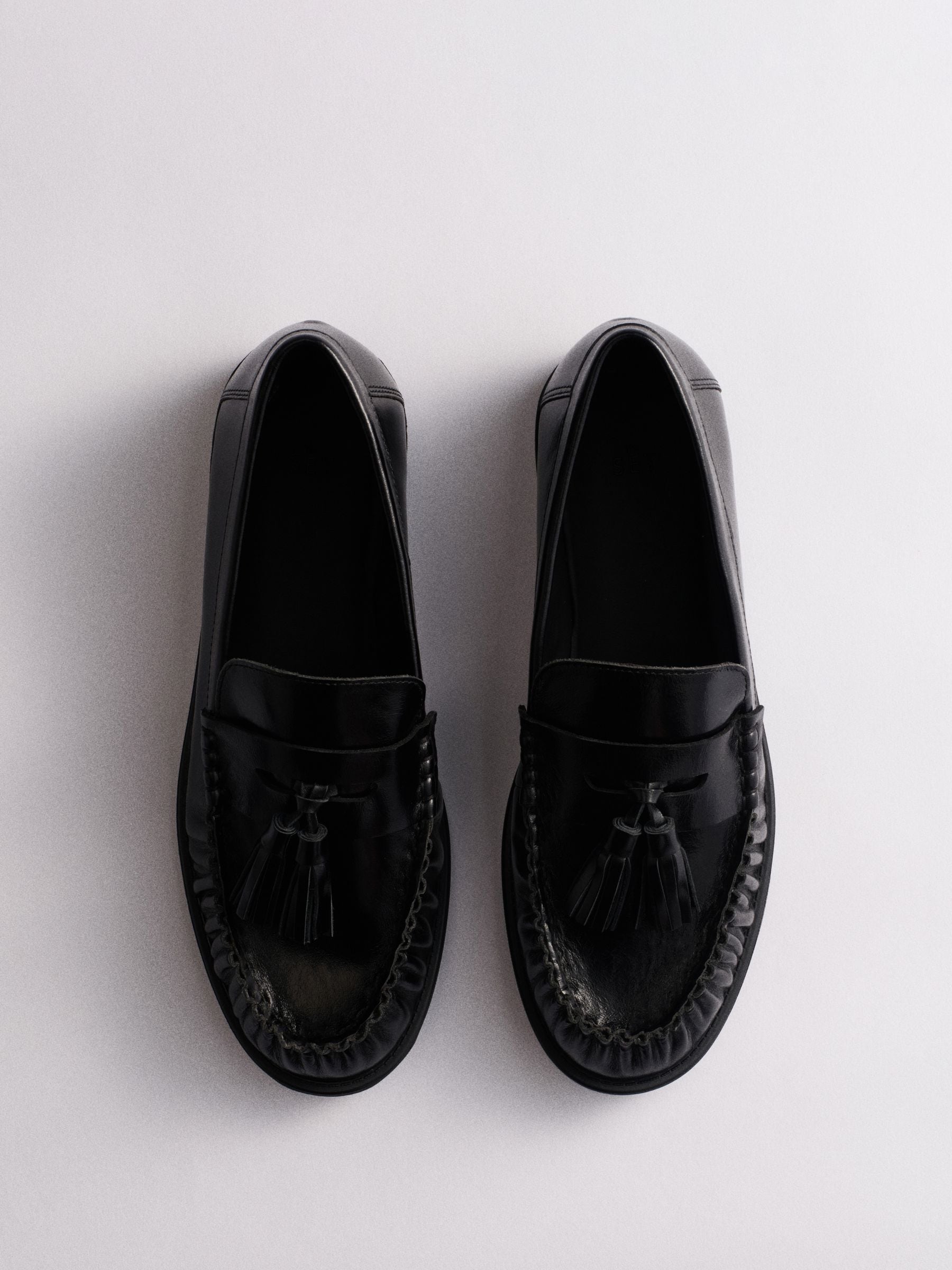 The Set Tassel Ruched Loafers - Black Leather - Regular - SIP Still Life