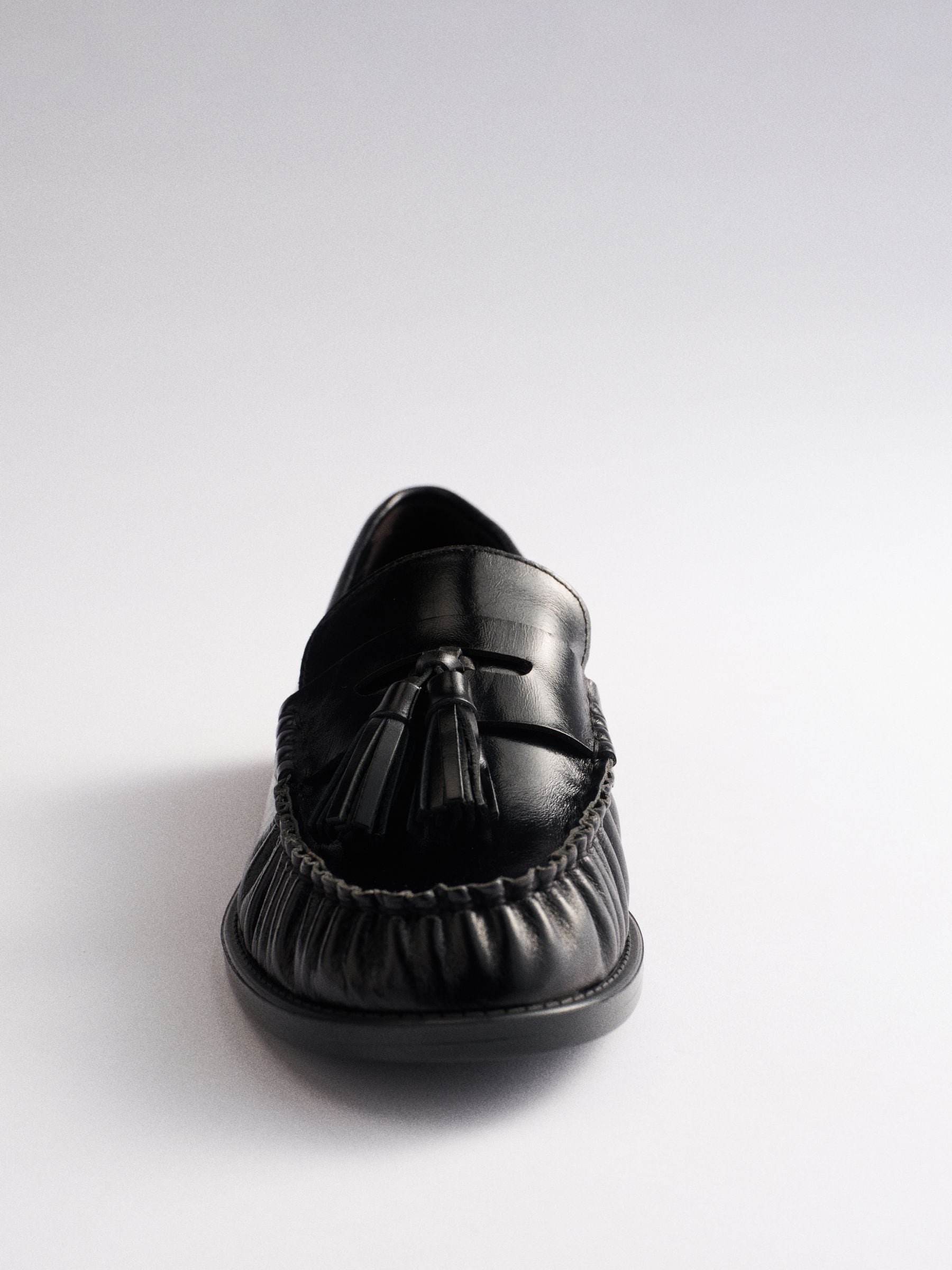 The Set Tassel Ruched Loafers - Black Leather - Regular - SIP Still Life