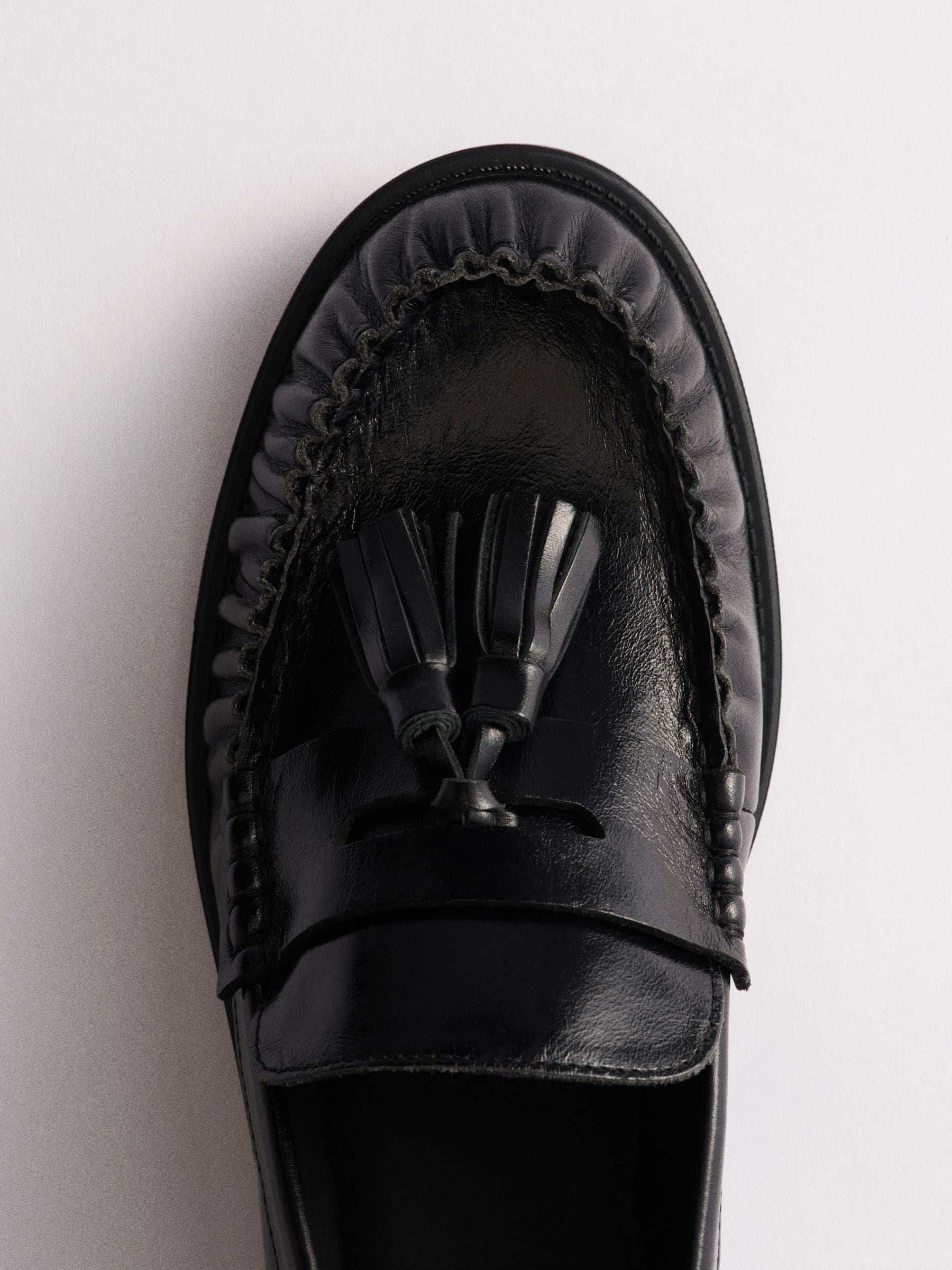The Set Tassel Ruched Loafers - Black Leather - Regular - SIP Still Life