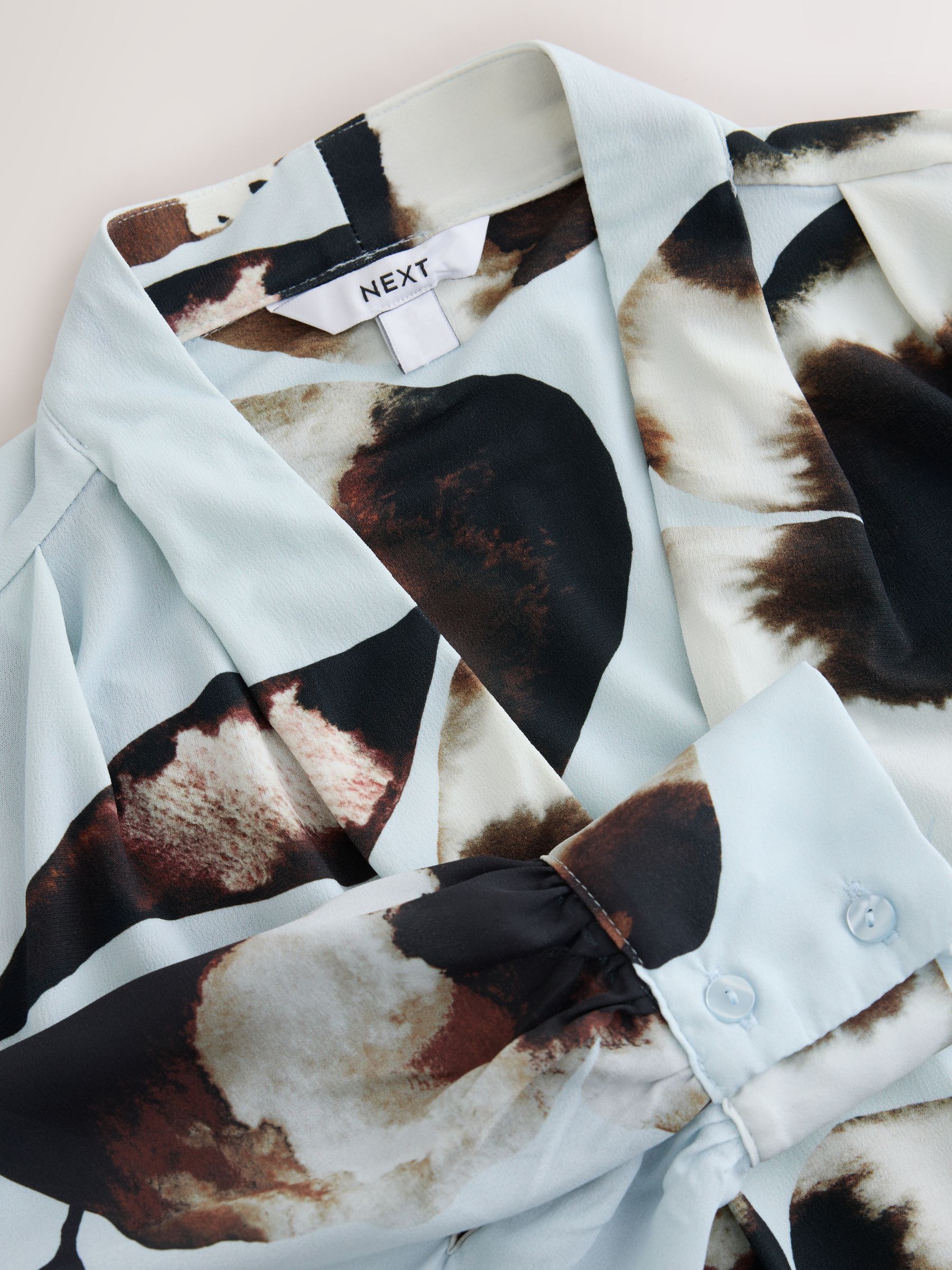 Long Sleeve V-Neck Cuff Top - Blue Floral Print - Regular - SIP Still Life