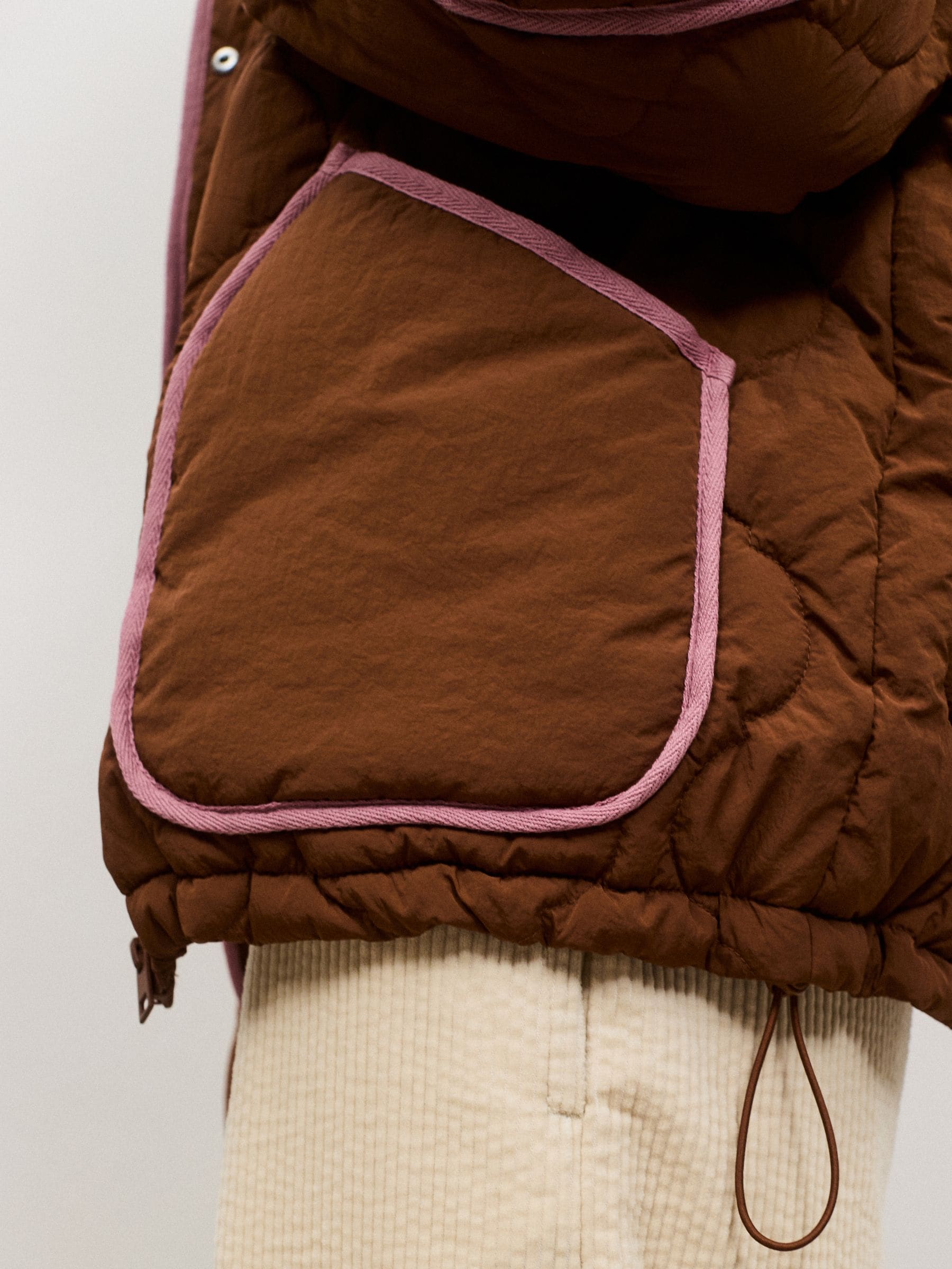 Shower Resistant Lightweight Quilted Jacket - Tan Brown with Pink Piping - Regular - Location Worn