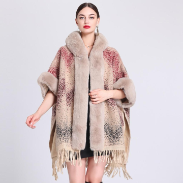 Women's Poncho With a Hoodie and Fringes