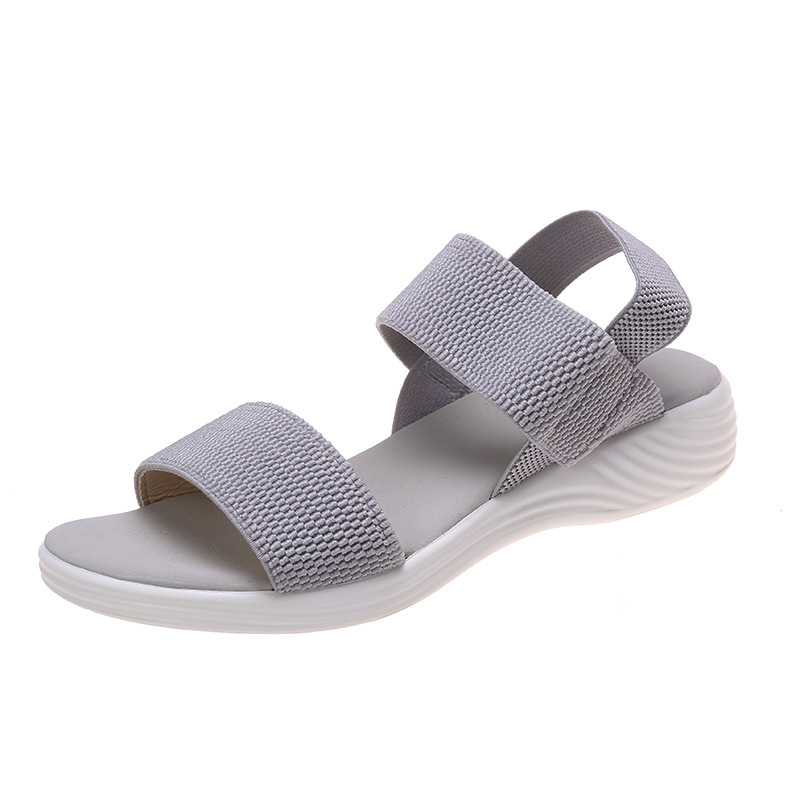 Sandale compensée à brides extensibles, semelle ondulée ergonomique
