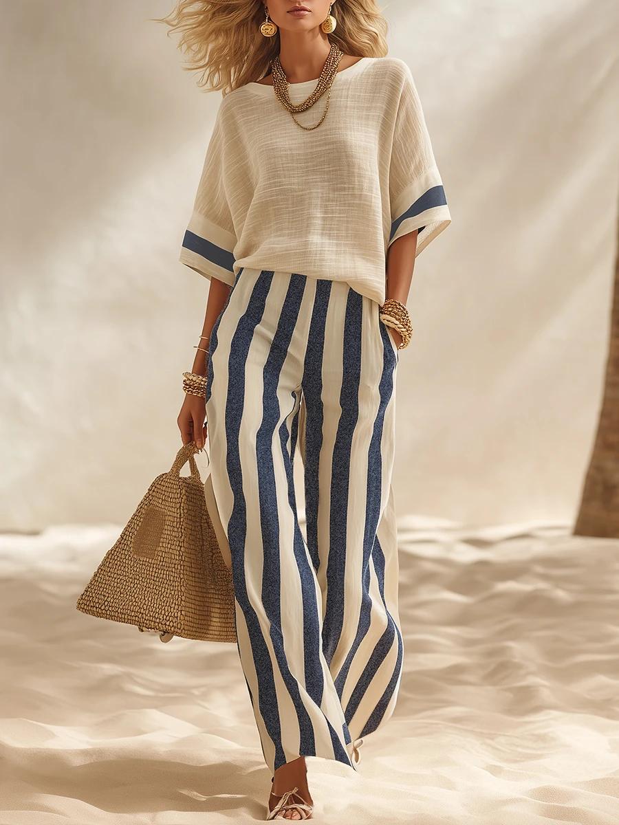 Ensemble haut beige texturé en coton-lin à blocs de couleurs et pantalon large taille élastique à rayures bleues et blanches.