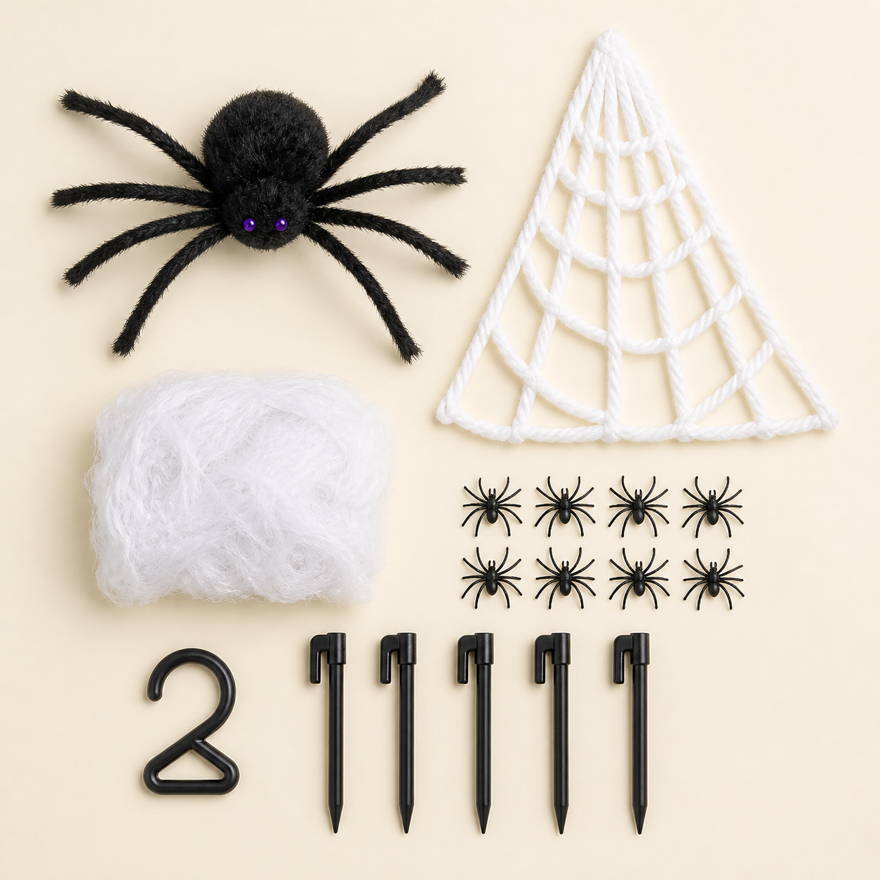 Flat lay showing the complete giant spider web yard kit