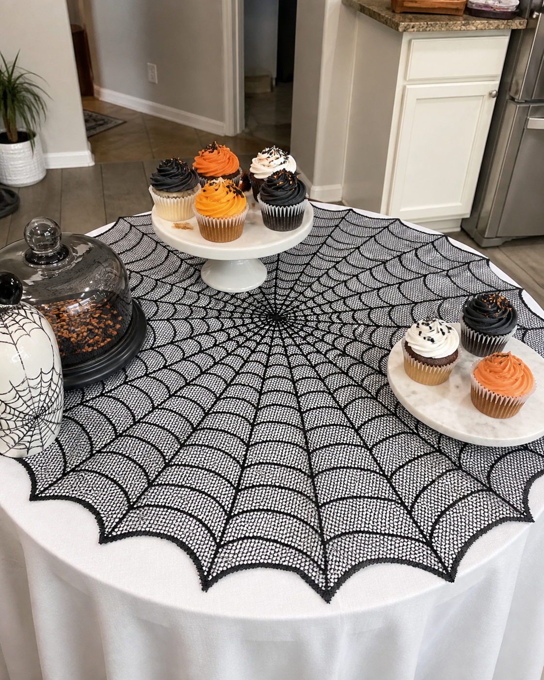 Spiderweb table topper party styling concept: dessert display