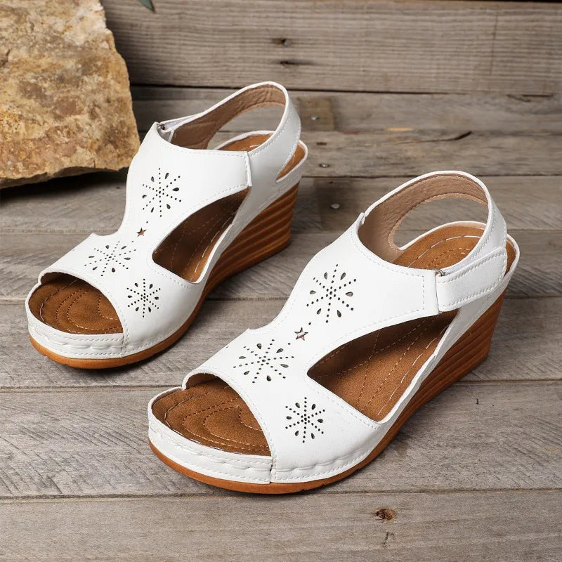 Meadowcut wedge sandals: Floral Cutouts in Focus
