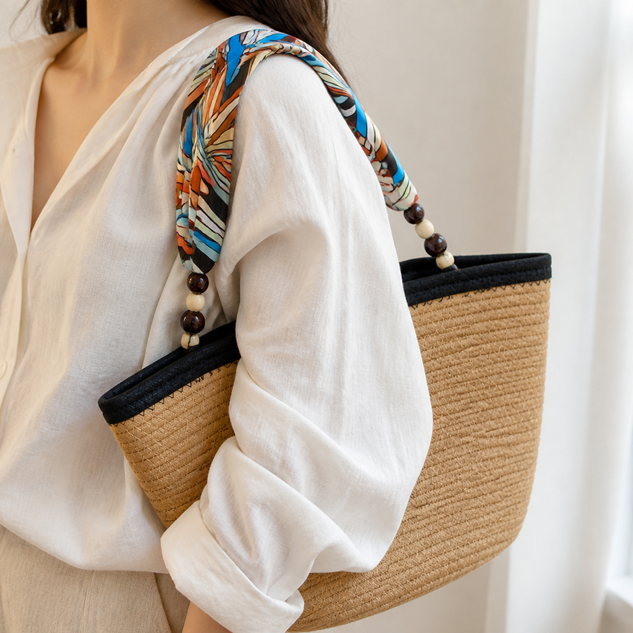 Printed scarf shoulder strap and bead connection in use