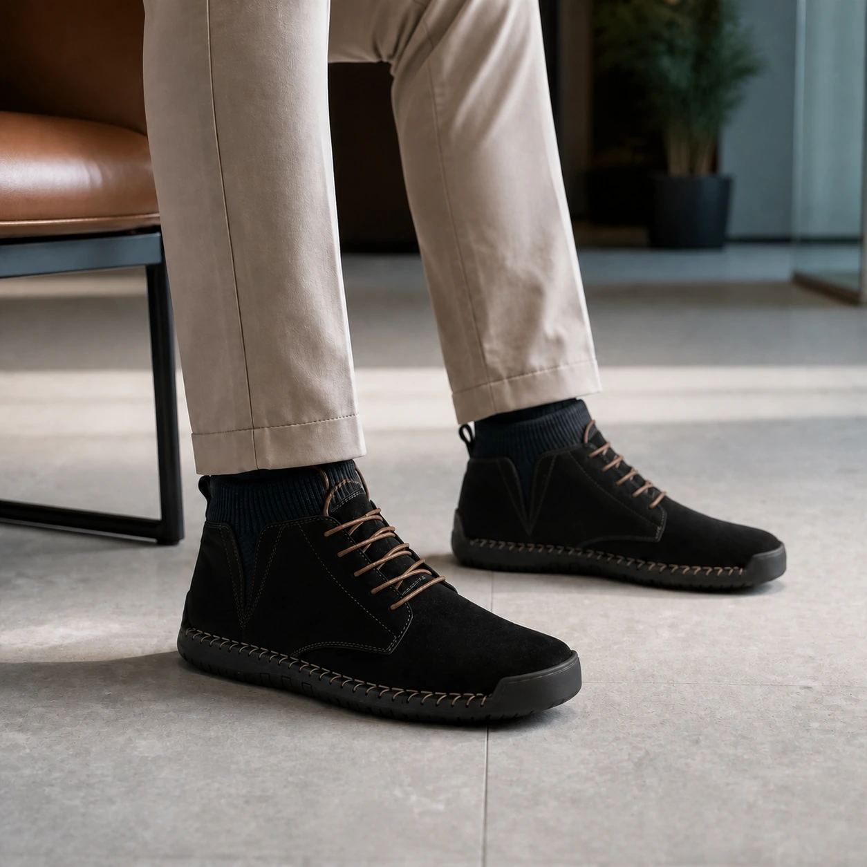 Man styling Kellan ankle boots with chinos for a smart casual outfit