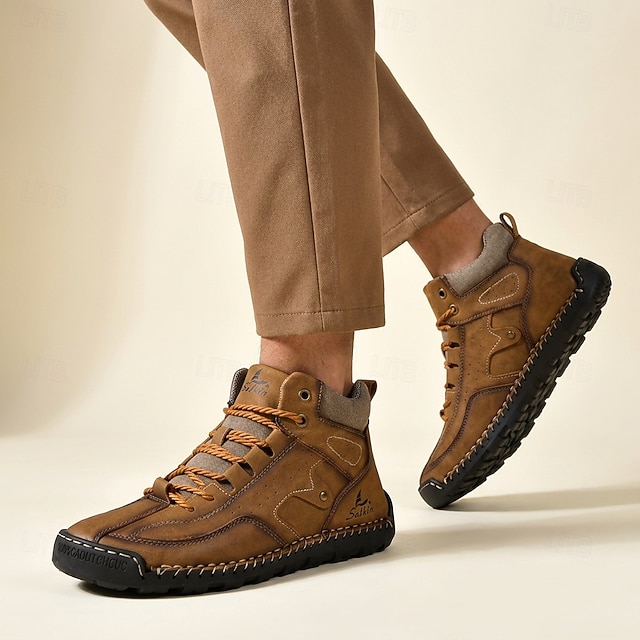 Brown hiking boots worn with casual pants