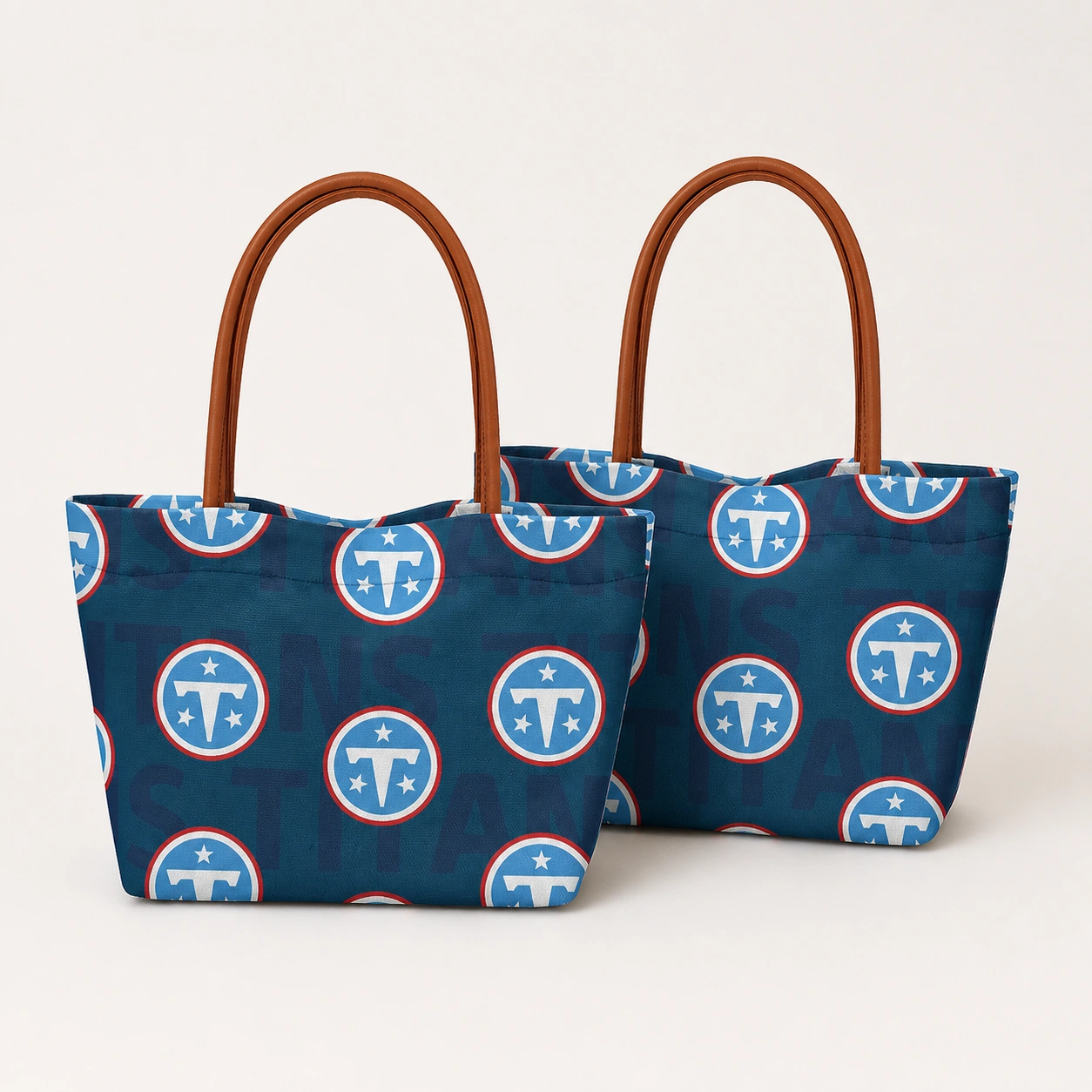 Two matching football team print tote bags