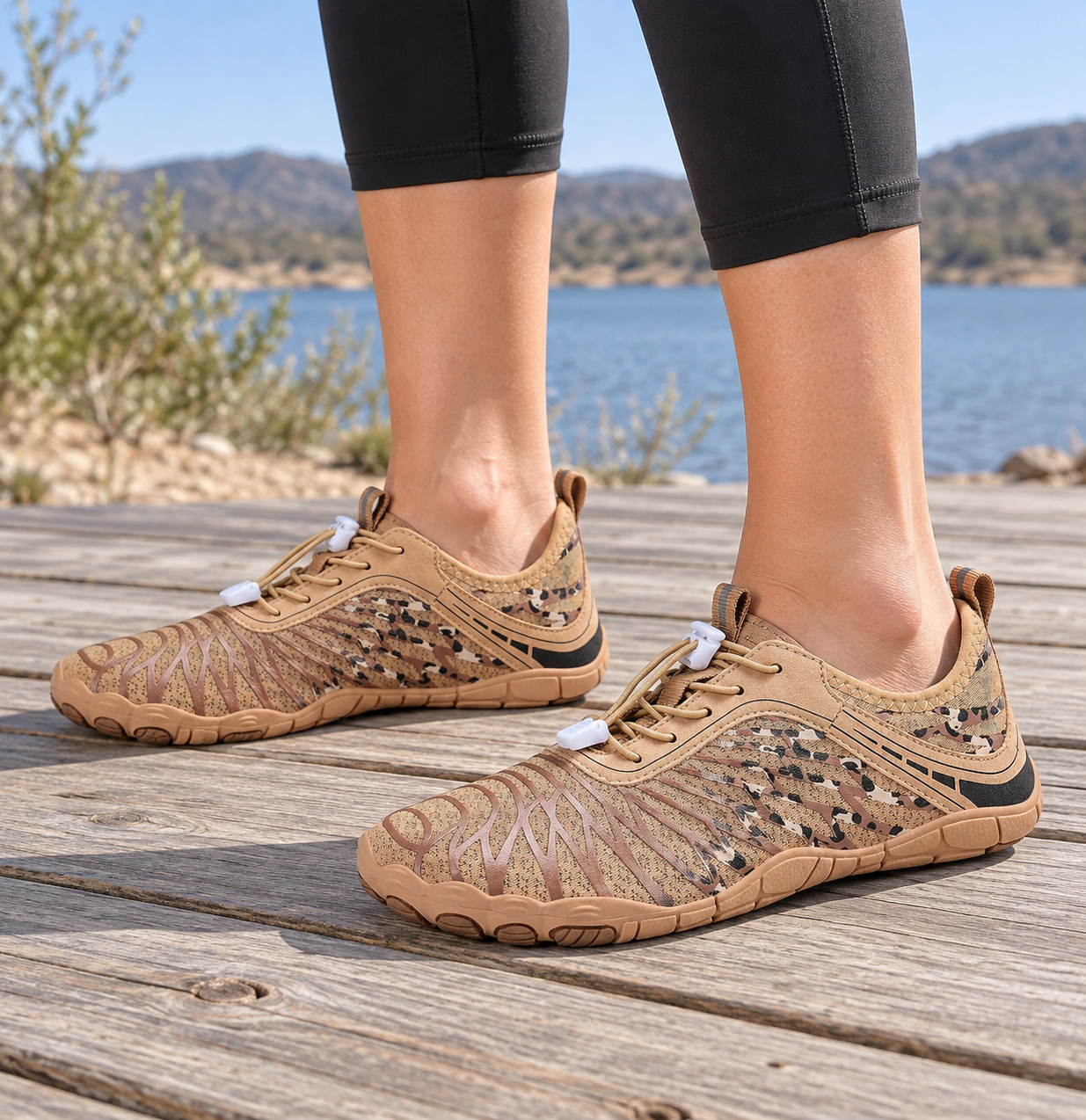 Model wearing tan mesh barefoot-style shoes