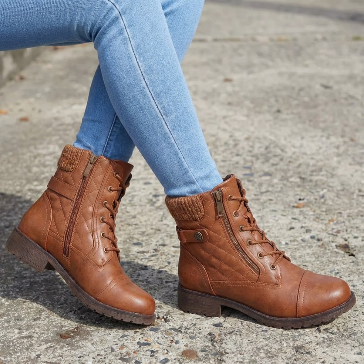 Model wearing Aria quilted lace-up ankle boots with jeans