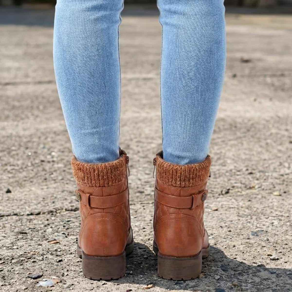Model wearing Aria quilted lace-up ankle boots with jeans
