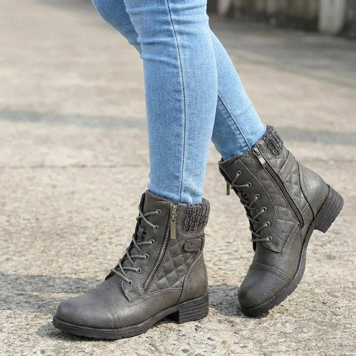 Model wearing Aria quilted lace-up ankle boots with jeans
