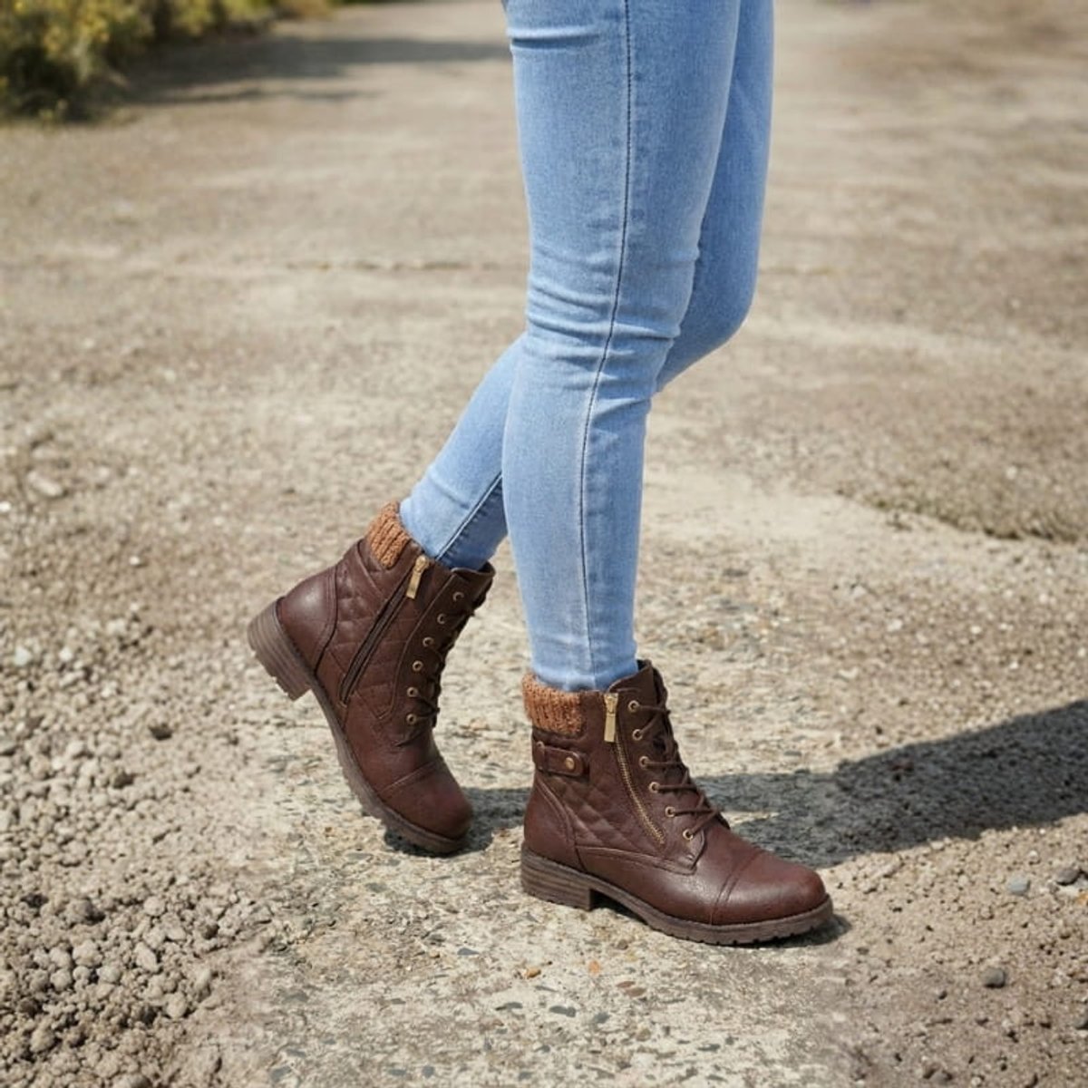 Model wearing Aria quilted lace-up ankle boots with jeans
