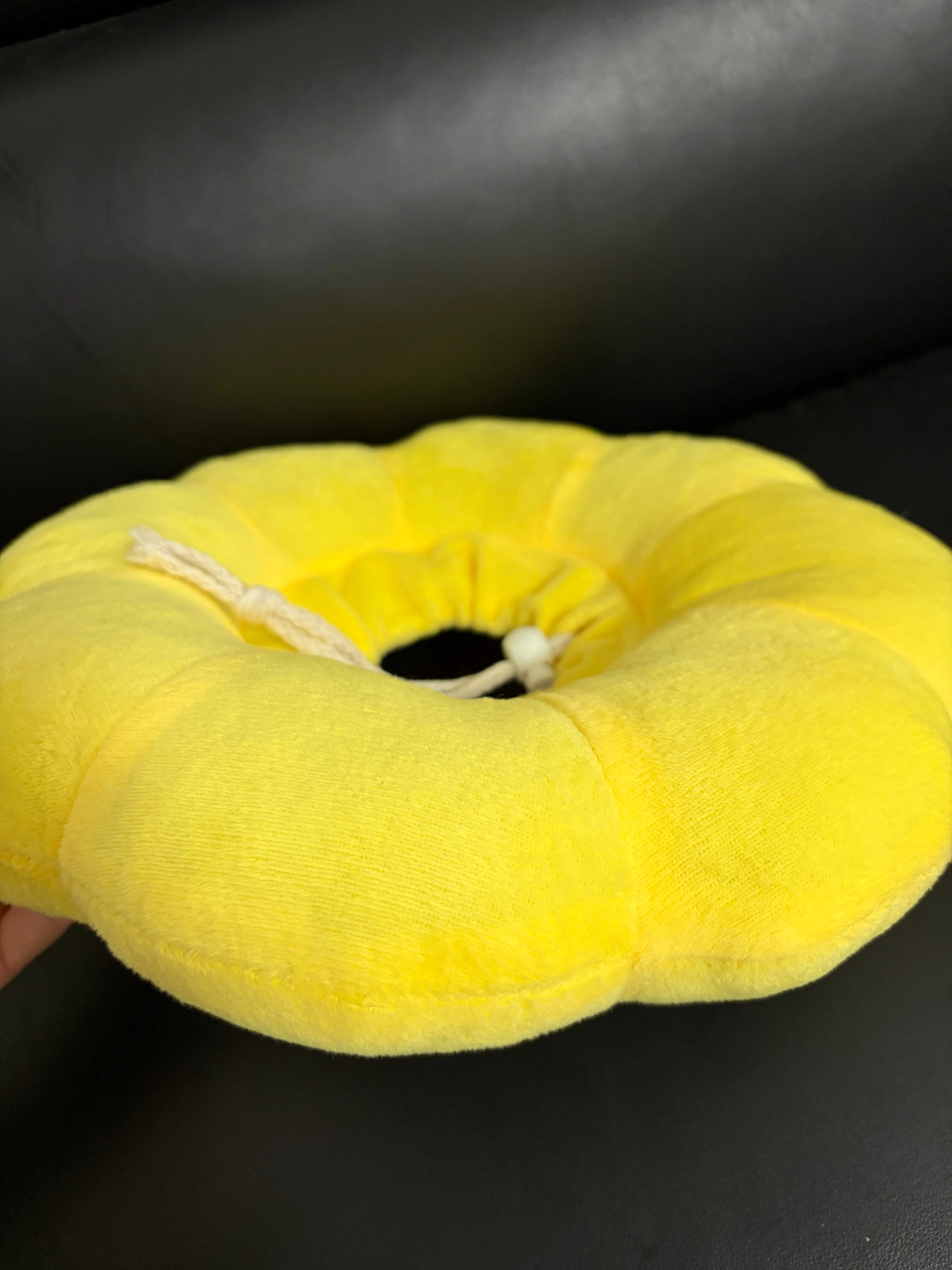 Sunflower recovery collar – side profile showing plush thickness and drawstring closure