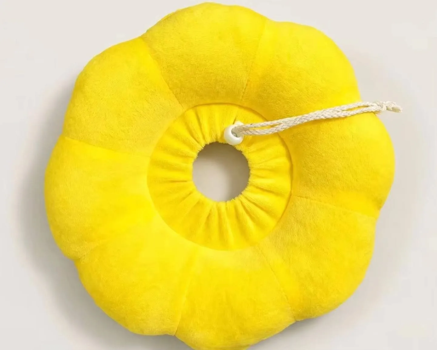 Sunflower soft recovery collar – bright yellow plush, front view on light background