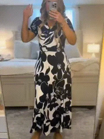 Animated view of the V-neck maxi dress flowing in motion