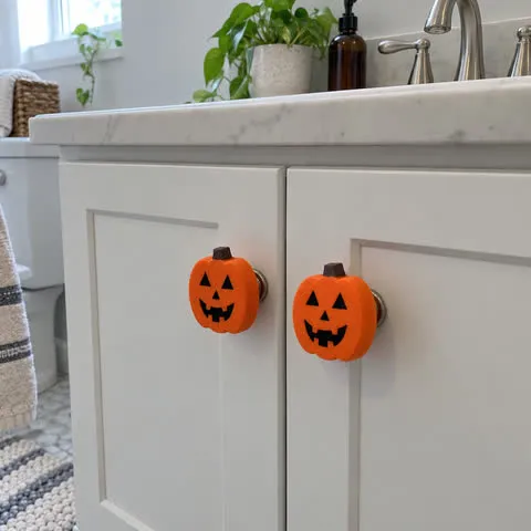 Pumpkin covers on a bathroom vanity