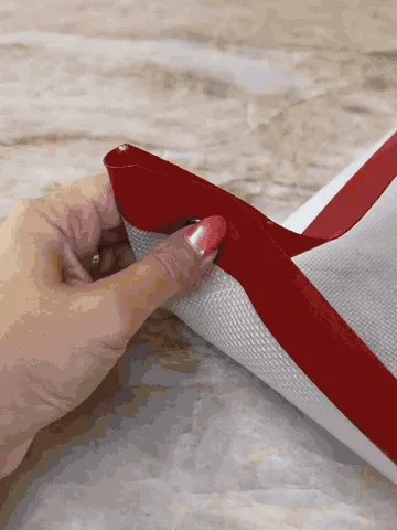 Snap-corner baking mat being prepared and used in the oven