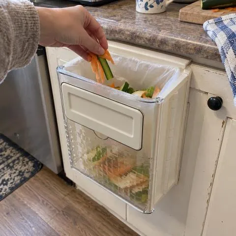 Cream white foldable bin in an everyday kitchen