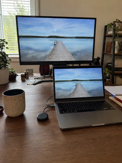 Laptop sharing a presentation to a desktop monitor