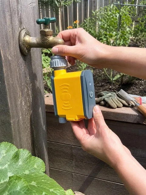 Installing the irrigation controller on a backyard faucet
