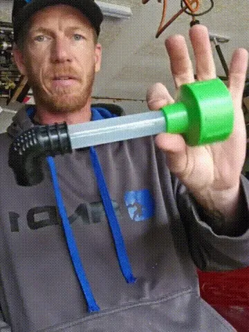 Animated demonstration of AC drain pipe cleaner adapter
