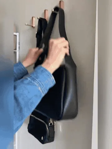 Press-to-open folding wall hook installation and use demonstration